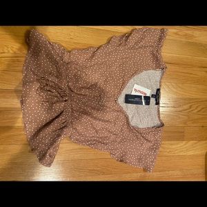 light brown/ caramel colored blouse.